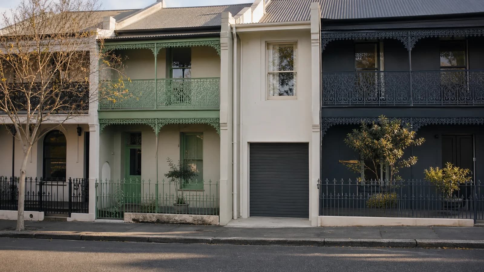 A Victorian terrace in inner Sydney with a narrow street-facing garage door in a heritage streetscape